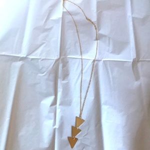 Gold colored triangle necklace